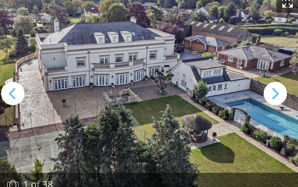 Large house and grounds with swimming pool for sale
