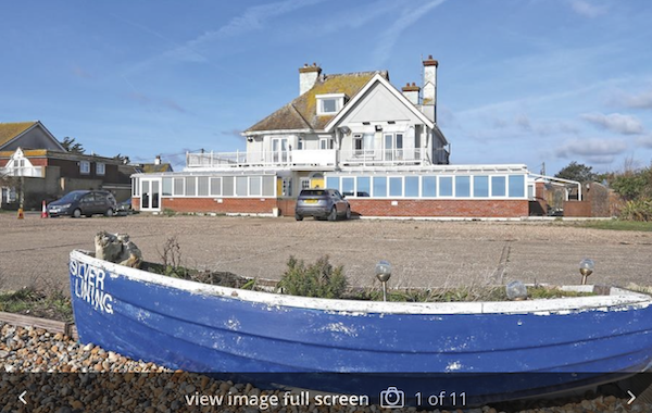 Beach-front house for sale