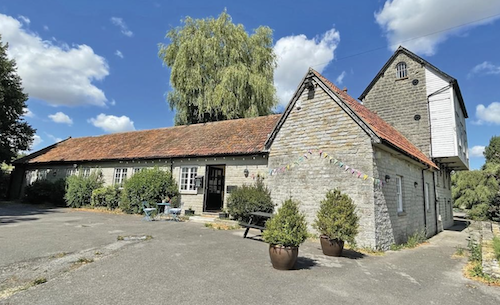 Mill house and barns for sale